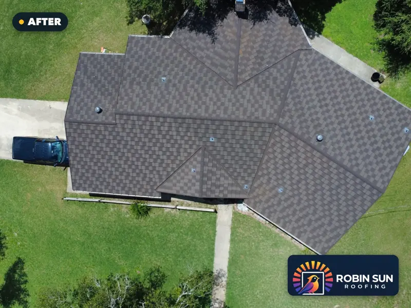 Drone view straight down on the same house with a new charcoal roof.