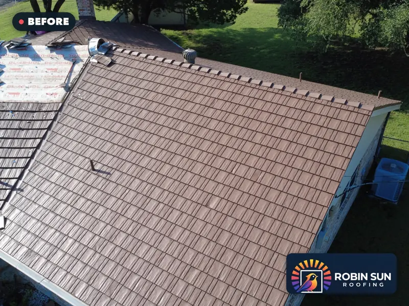 Drone view of a weathered brown roof before replacement.